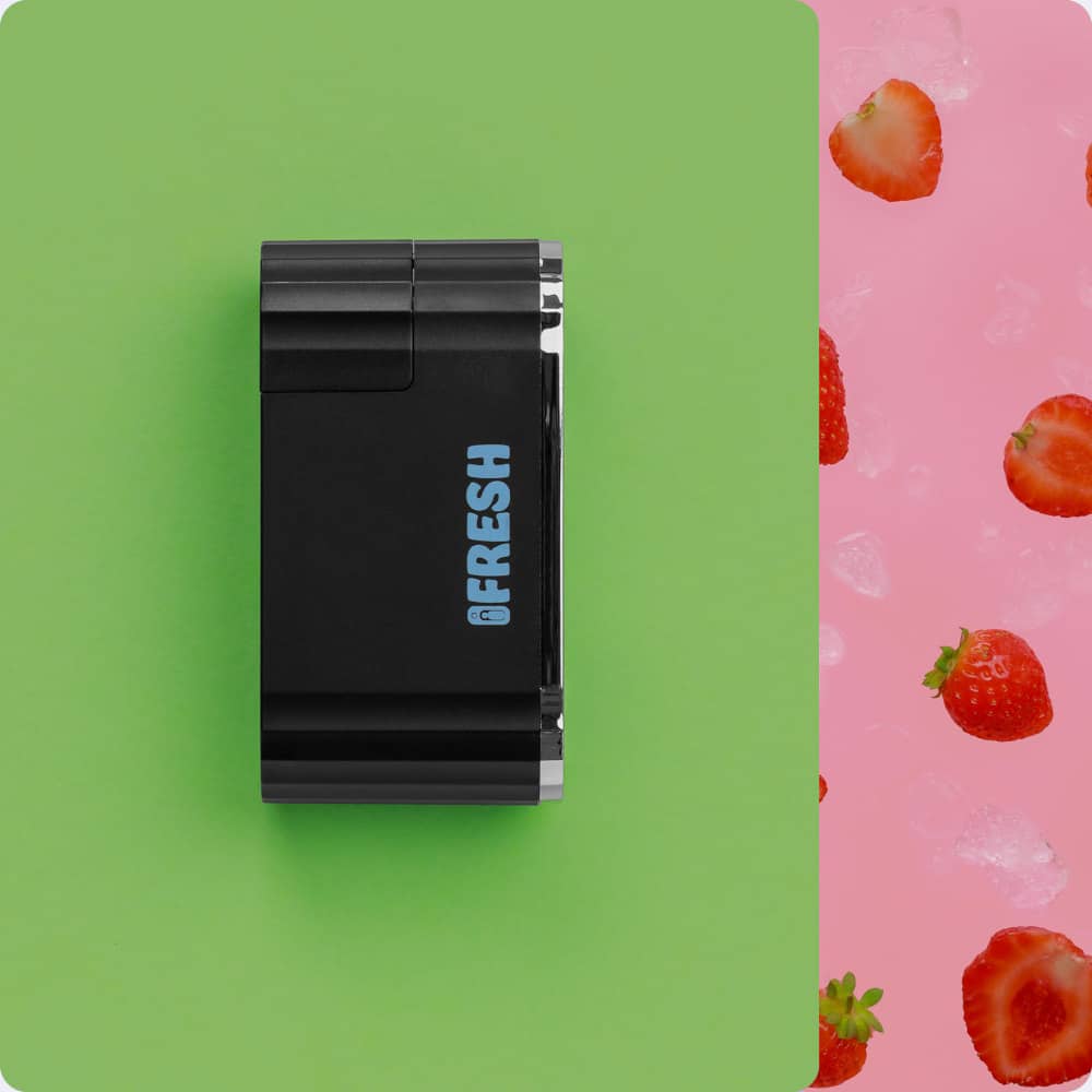 iFresh device in black with 4 FreshFill strawberry refills